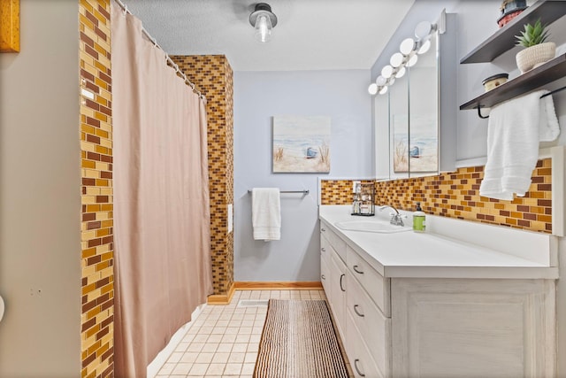 1680 Bluebird Ln, Mound, MN 55364 - full bath with tasteful backsplash, vanity, baseboards, tile patterned floors, and curtained shower