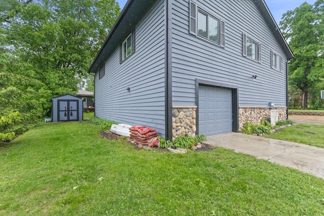 1680 Bluebird Ln, Mound, MN 55364 - view of side of home featuring a garage, a yard, stone siding, and concrete driveway