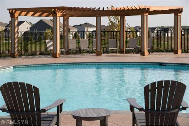 5010 Sandpebble Ln, Woodbury, MN 55129 - community pool with a pergola