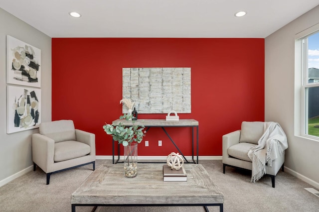 5010 Sandpebble Ln, Woodbury, MN 55129 - living area with an accent wall, carpet floors, recessed lighting, and baseboards