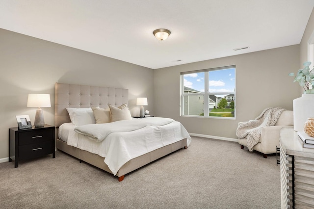 5010 Sandpebble Ln, Woodbury, MN 55129 - bedroom with baseboards and light colored carpet