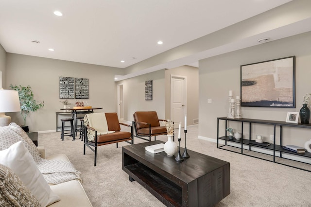 5010 Sandpebble Ln, Woodbury, MN 55129 - living room featuring light colored carpet, recessed lighting, and baseboards