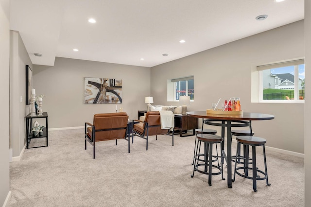 5010 Sandpebble Ln, Woodbury, MN 55129 - dining room with light colored carpet, baseboards, and recessed lighting