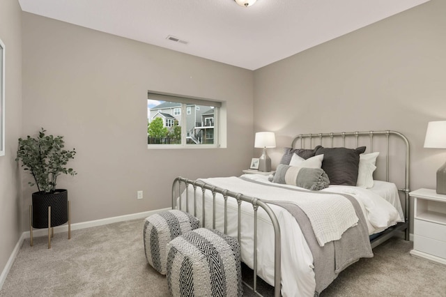 5010 Sandpebble Ln, Woodbury, MN 55129 - carpeted bedroom featuring baseboards