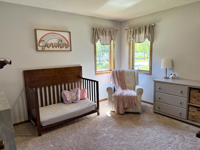 507 Pine Ridge Ter, River Falls, WI 54022 - carpeted bedroom featuring a textured ceiling and baseboards