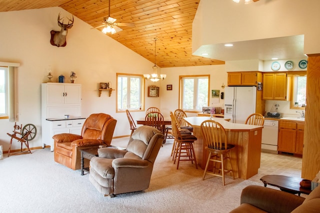 11005 320th St, Clover Twp, MN 56470 - living area featuring high vaulted ceiling, a ceiling fan, light colored carpet, wooden ceiling, and a chandelier