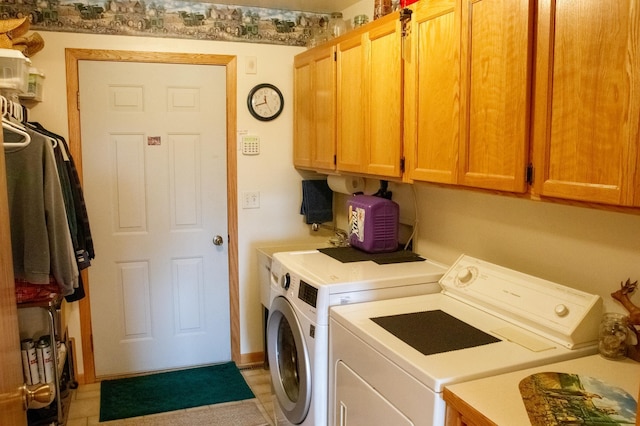 11005 320th St, Clover Twp, MN 56470 - laundry area featuring washing machine and clothes dryer and cabinet space