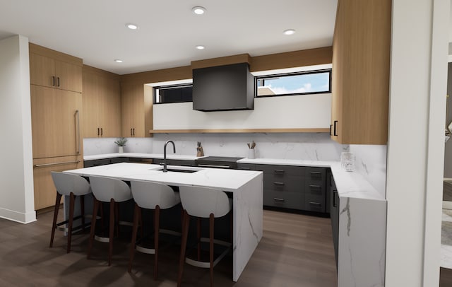2815 44th St Unit 15, Minneapolis, MN 55410 - kitchen with a sink, light stone countertops, a breakfast bar area, an island with sink, and recessed lighting