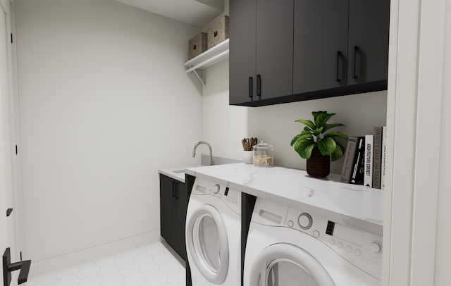 2815 44th St Unit 15, Minneapolis, MN 55410 - laundry room with washing machine and clothes dryer, cabinet space, and tile patterned flooring