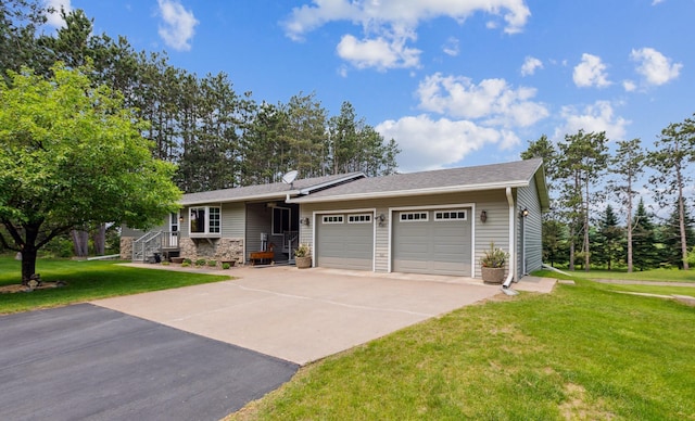 4765 344th Ln NW, Cambridge, MN 55008 - view of front of house featuring an attached garage, concrete driveway, and a front lawn