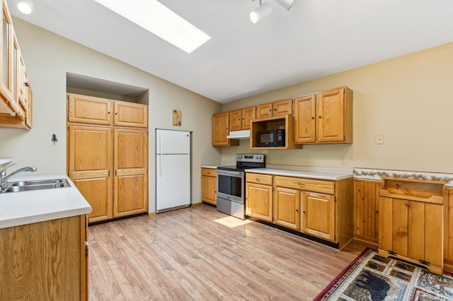 4765 344th Ln NW, Cambridge, MN 55008 - kitchen featuring freestanding refrigerator, stainless steel electric range oven, a sink, vaulted ceiling, and black microwave