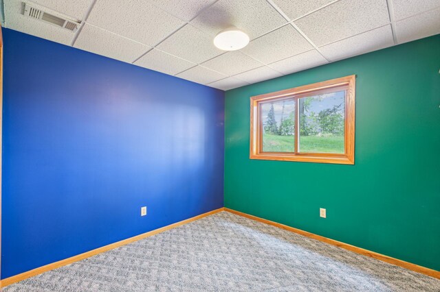 4765 344th Ln NW, Cambridge, MN 55008 - carpeted spare room featuring a drop ceiling and baseboards