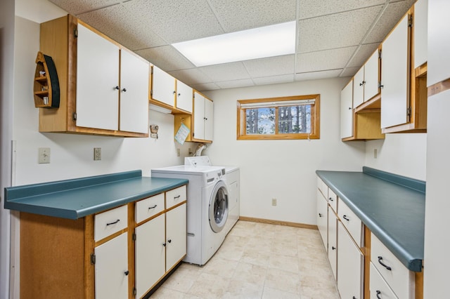 4765 344th Ln NW, Cambridge, MN 55008 - laundry area with cabinet space, washing machine and dryer, and baseboards