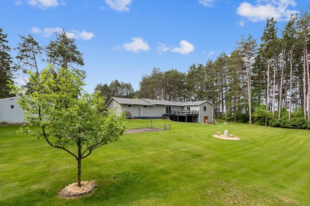 4765 344th Ln NW, Cambridge, MN 55008 - view of green lawn with a wooden deck