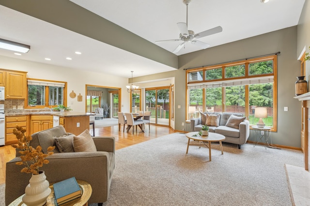 307 Lincoln Dr SE, Saint Michael, MN 55376 - living room with a chandelier, recessed lighting, plenty of natural light, light wood-style flooring, and a ceiling fan