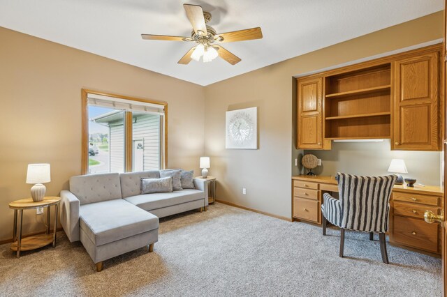 307 Lincoln Dr SE, Saint Michael, MN 55376 - office featuring built in desk, light carpet, a ceiling fan, and baseboards