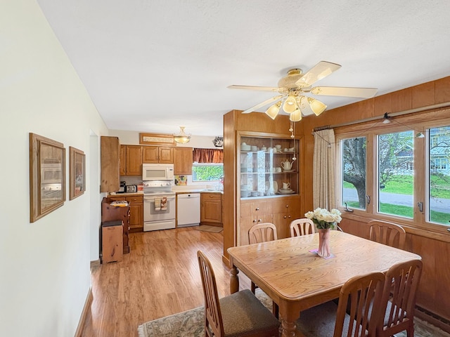 602 26th St, Scanlon, MN 55720 - dining area featuring light wood finished floors and ceiling fan