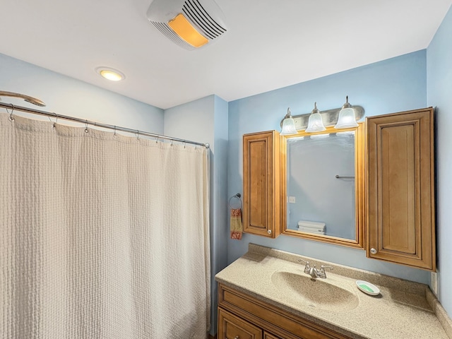 602 26th St, Scanlon, MN 55720 - full bath featuring vanity and a shower with shower curtain