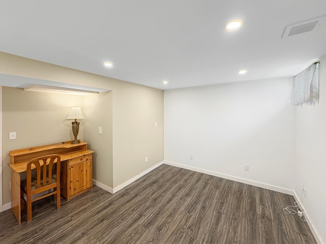 602 26th St, Scanlon, MN 55720 - finished below grade area featuring dark wood-style floors, baseboards, and recessed lighting