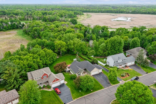 582 139th Ln NW, Andover, MN 55304 - aerial perspective of suburban area with a heavily wooded area