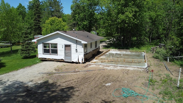 42606 Pleasure Park Rd, Otter Tail Twp, MN 56571 - back of property with driveway