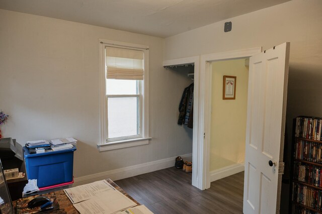 835 Park St, Fairmont, MN 56031 - interior space featuring baseboards and dark wood-style flooring