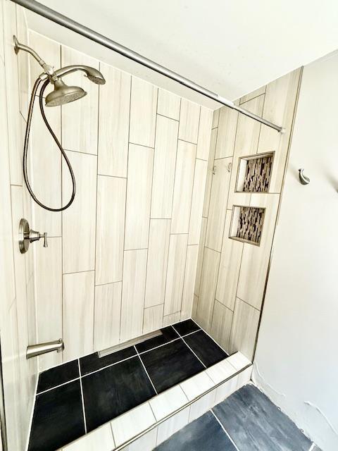 220 Front St E, Redwood Falls, MN 56283 - full bath featuring a tile shower