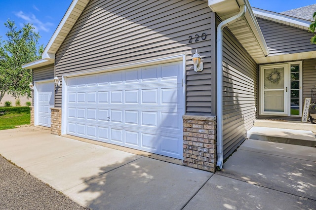 220 Maverick Ave, Elko New Market, MN 55054 - garage featuring driveway