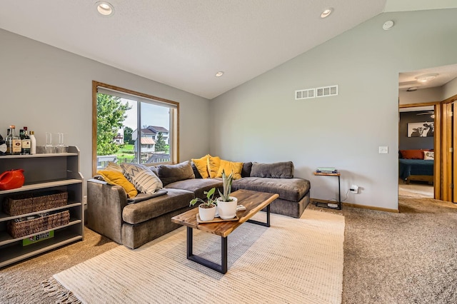 220 Maverick Ave, Elko New Market, MN 55054 - carpeted living room featuring lofted ceiling and recessed lighting