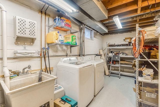 1221 43rd Ave NE, Columbia Heights, MN 55421 - laundry room with washing machine and dryer and concrete block wall