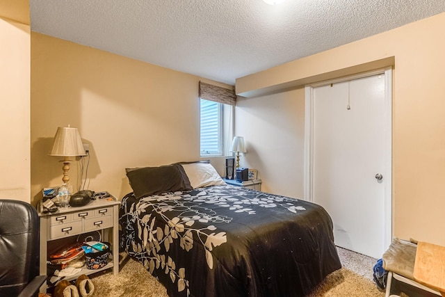 1221 43rd Ave NE, Columbia Heights, MN 55421 - bedroom with light colored carpet and a textured ceiling