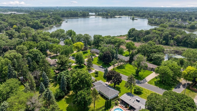5456 Twin Lake Blvd E, Brooklyn Center, MN 55429 - drone / aerial view of a nearby body of water and a heavily wooded area