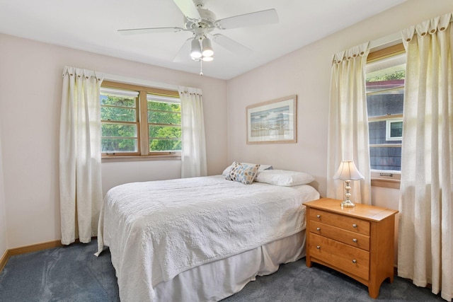 5456 Twin Lake Blvd E, Brooklyn Center, MN 55429 - carpeted bedroom featuring ceiling fan and baseboards