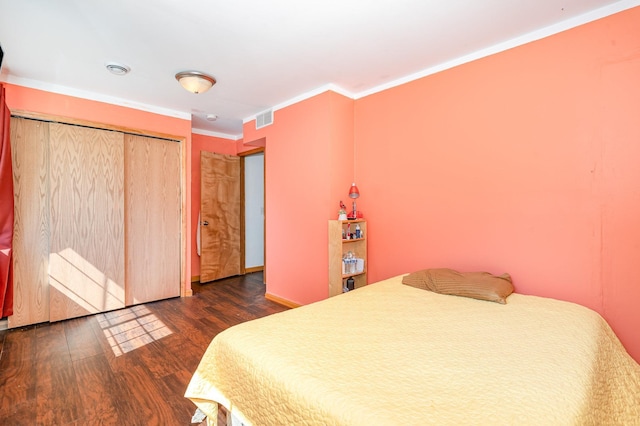 4037 42nd Ave S, Minneapolis, MN 55406 - bedroom with wood finished floors, crown molding, a closet, and baseboards