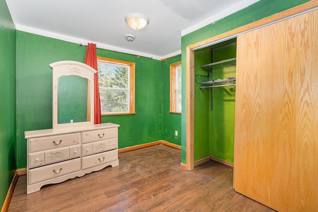 4037 42nd Ave S, Minneapolis, MN 55406 - bedroom with a closet, wood finished floors, and baseboards