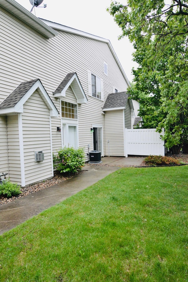 9452 Marshall Rd, Eden Prairie, MN 55347 - rear view of house with a shingled roof
