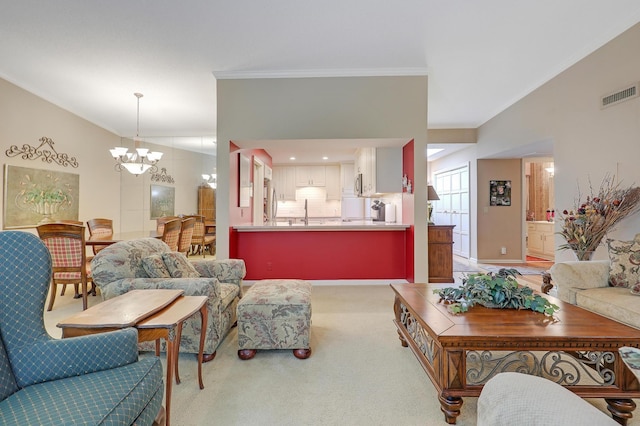 5601 Dewey Hill Rd Unit 310, Edina, MN 55439 - living area with crown molding, a chandelier, and light carpet
