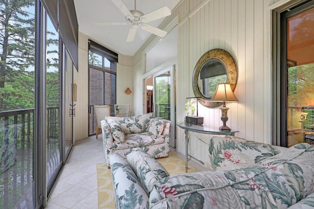 5601 Dewey Hill Rd Unit 310, Edina, MN 55439 - sunroom featuring a high ceiling, tile patterned floors, and wood walls