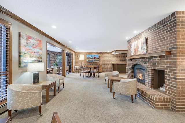 5601 Dewey Hill Rd Unit 310, Edina, MN 55439 - carpeted living room featuring recessed lighting, a brick fireplace, crown molding, and brick wall