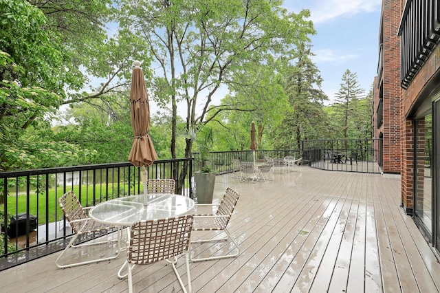 5601 Dewey Hill Rd Unit 310, Edina, MN 55439 - wooden terrace featuring outdoor dining space