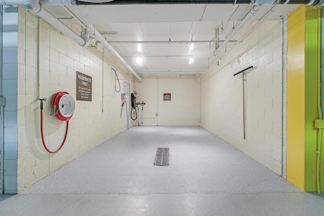 5601 Dewey Hill Rd Unit 310, Edina, MN 55439 - garage featuring concrete block wall