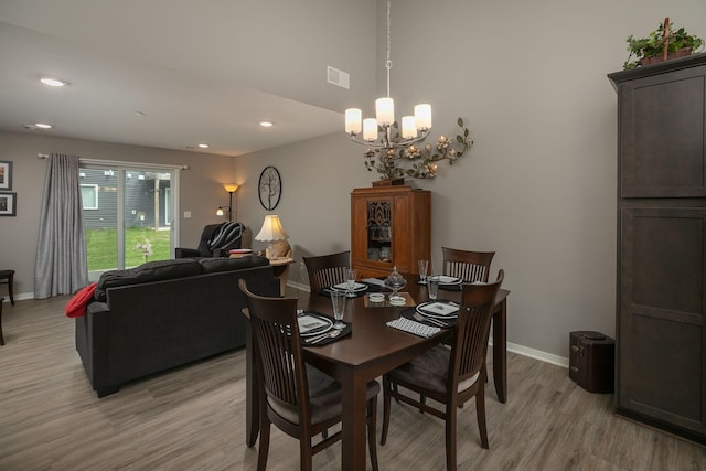 1217 Sundance Ct NE, Byron, MN 55920 - dining room with light wood-style flooring, a chandelier, baseboards, and recessed lighting