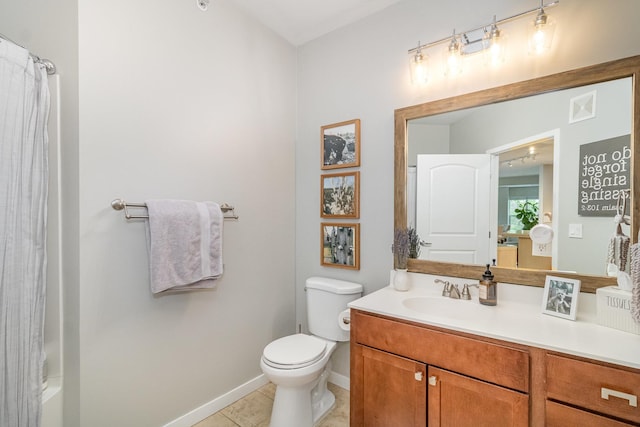 4132 Vernon Ave S Unit A101, Saint Louis Park, MN 55416 - bathroom featuring vanity, toilet, tile patterned flooring, and baseboards