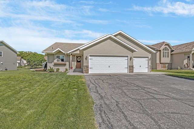 24405 18th Ave, Saint Augusta, MN 56301 - view of front of property with asphalt driveway, an attached garage, and a front yard