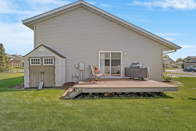 24405 18th Ave, Saint Augusta, MN 56301 - rear view of house with a deck and a lawn