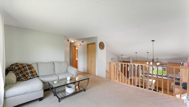 24405 18th Ave, Saint Augusta, MN 56301 - living area with carpet floors and a chandelier