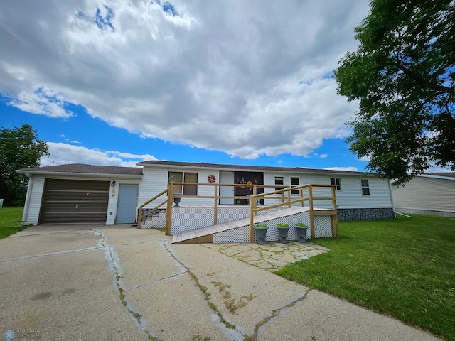 4732 San Juan Dr, Fargo, ND 58103 - view of front of property with concrete driveway, a front lawn, and a deck