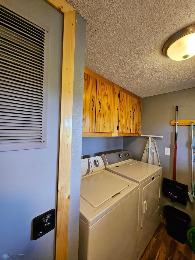 4732 San Juan Dr, Fargo, ND 58103 - laundry room with cabinet space, a heating unit, washing machine and dryer, and a textured ceiling