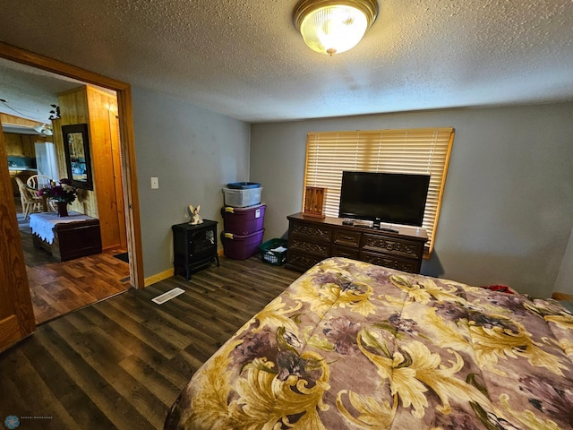 4732 San Juan Dr, Fargo, ND 58103 - bedroom with wood finished floors and a textured ceiling