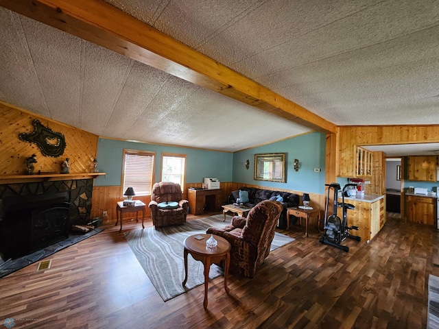 4732 San Juan Dr, Fargo, ND 58103 - living area with wood walls, wood finished floors, and a wood stove